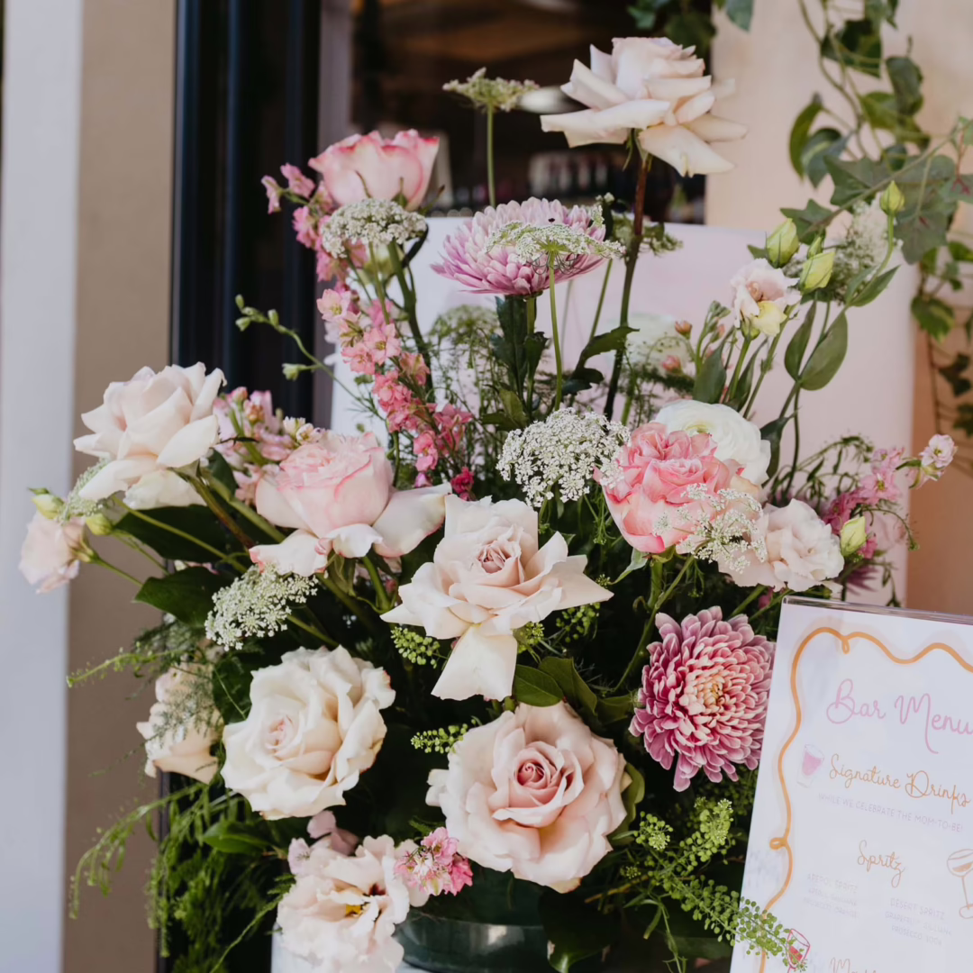 Soft blush and ivory florals by Miss Daisy Floral for Caitlyn’s baby shower in Las Vegas, elegant, romantic, and full of natural charm