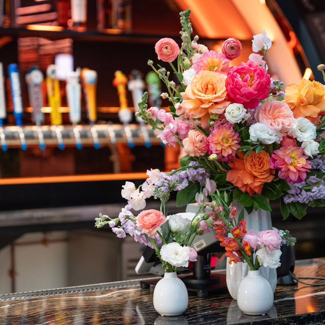 Miss Daisy Floral event design with bright florals and sleek decor for Google Cloud Sphere Las Vegas